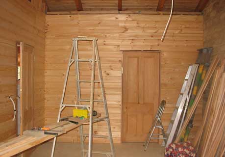 pine wall in bedroom